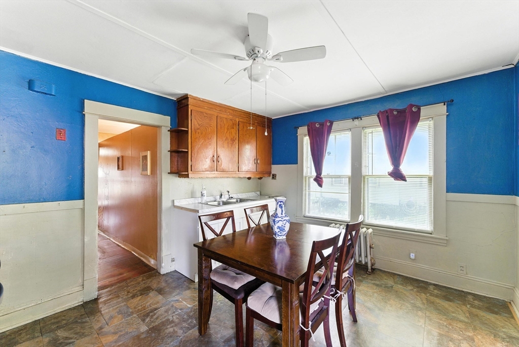 18-20 Eldridge Street Springfield, MA 01108 - Photo 5 of 42 a view of a dining room with furniture window and outside view