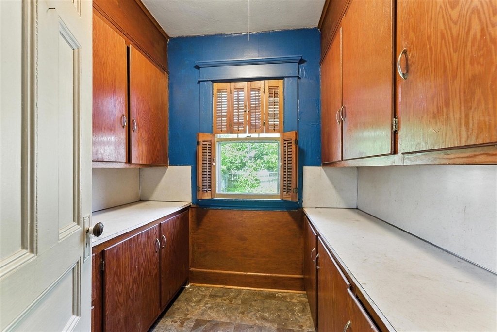 18-20 Eldridge Street Springfield, MA 01108 - Photo 6 of 42 a view of a room with window and furniture