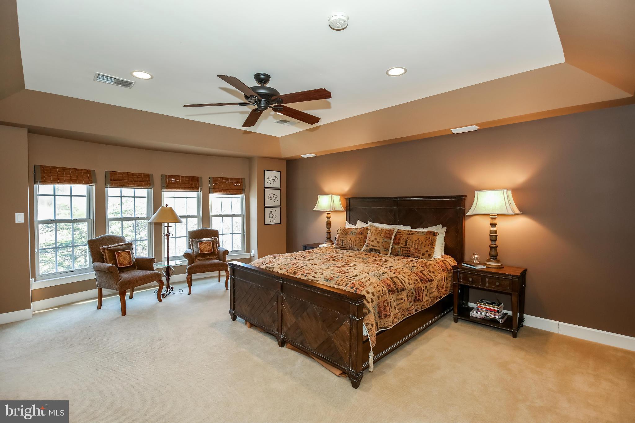 10403 Grey Fox Road Potomac, MD 20854 - Photo 11 of 23 a bedroom with a bed and a couch