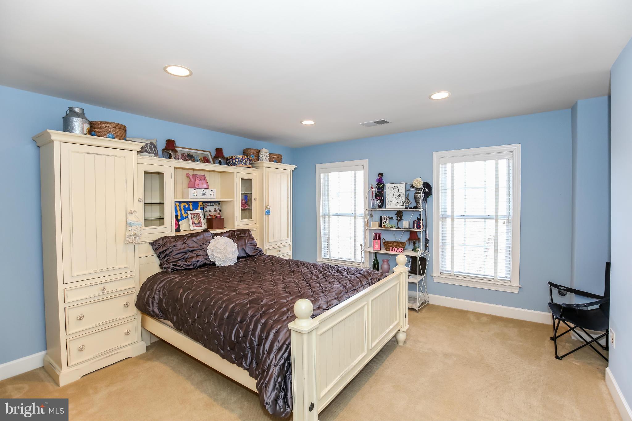 10403 Grey Fox Road Potomac, MD 20854 - Photo 15 of 23 a bed room with a bed and a window