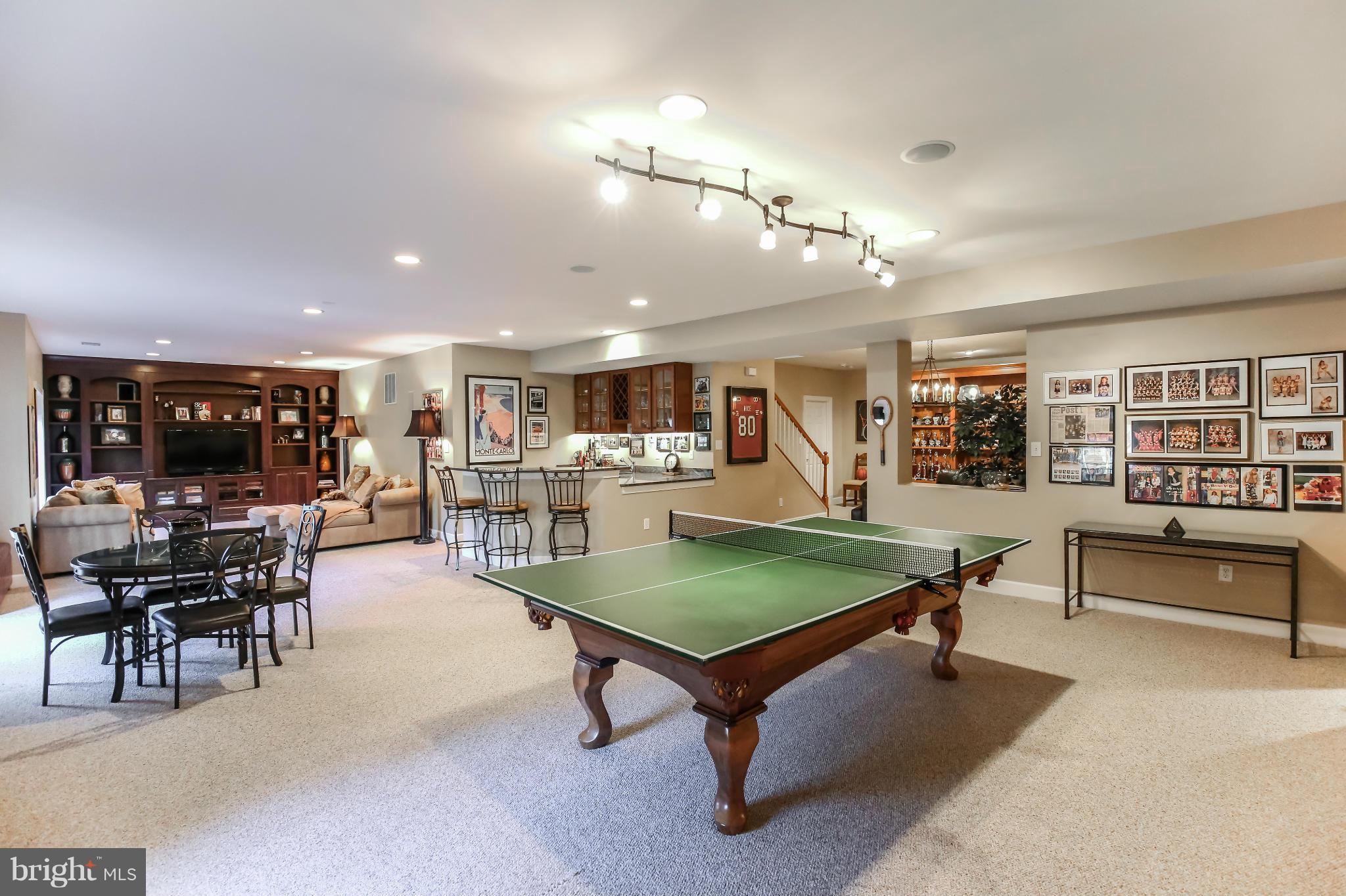 10403 Grey Fox Road Potomac, MD 20854 - Photo 19 of 23 a room with lots of furniture and a table