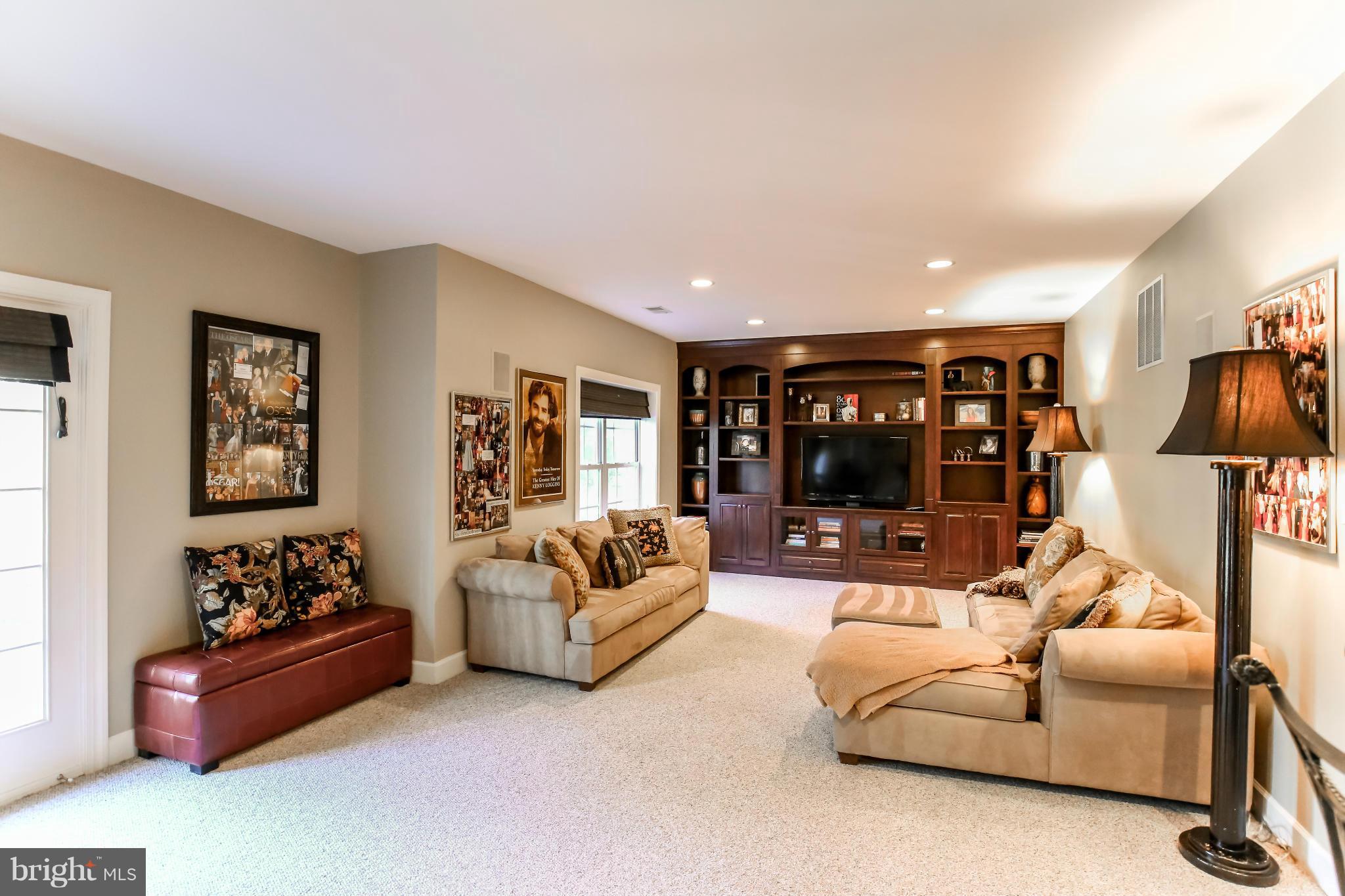 10403 Grey Fox Road Potomac, MD 20854 - Photo 20 of 23 a living room with furniture and large window