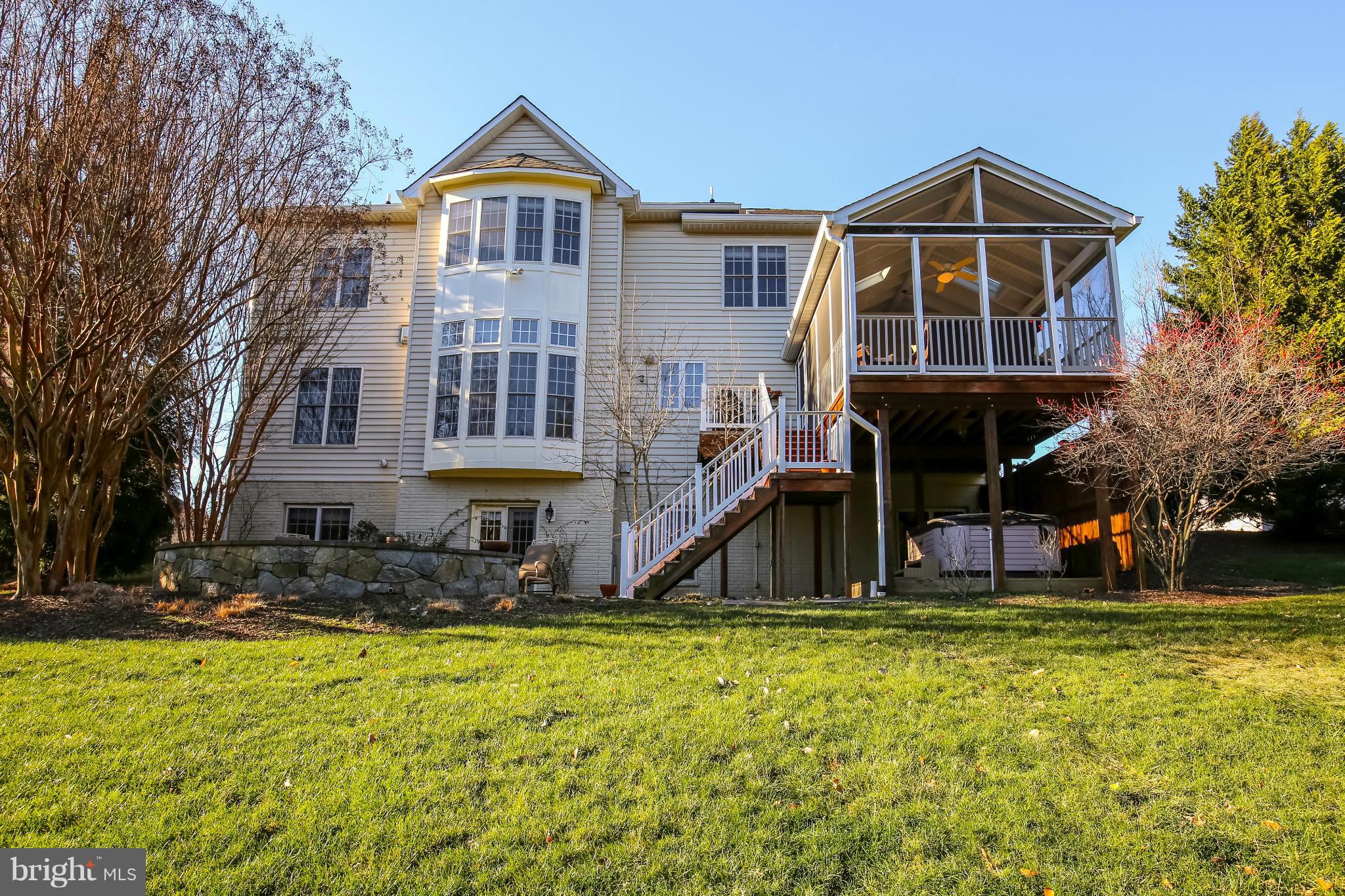 10403 Grey Fox Road Potomac, MD 20854 - Photo 23 of 23 a front view of a house with a yard