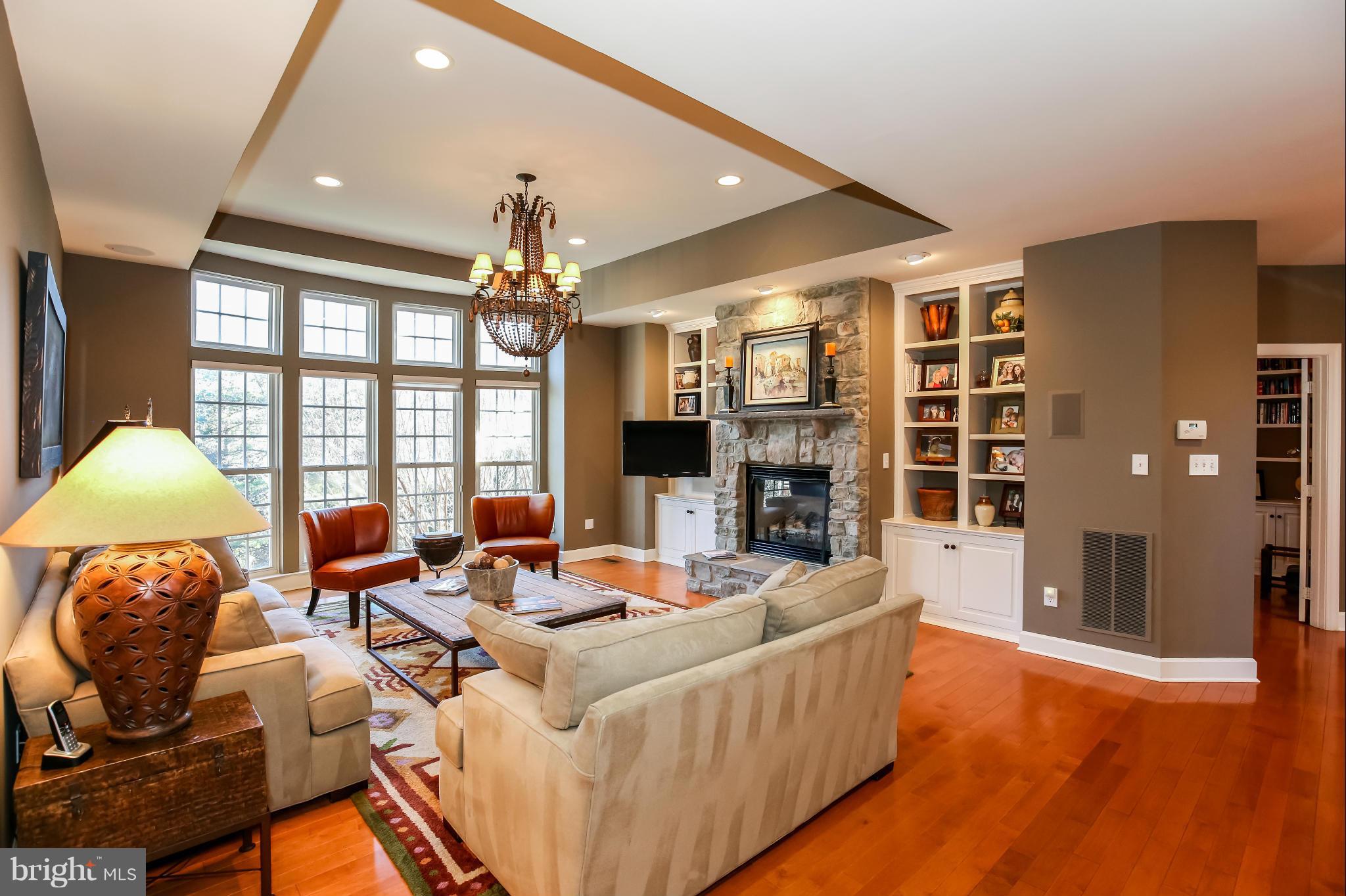 10403 Grey Fox Road Potomac, MD 20854 - Photo 6 of 23 a living room with fireplace furniture and a large window