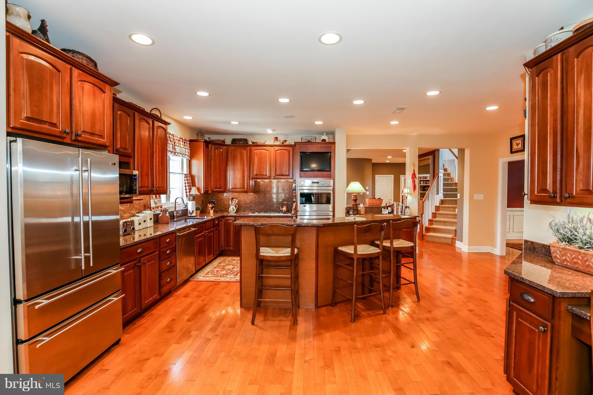 10403 Grey Fox Road Potomac, MD 20854 - Photo 7 of 23 a kitchen with stainless steel appliances lots of counter top space