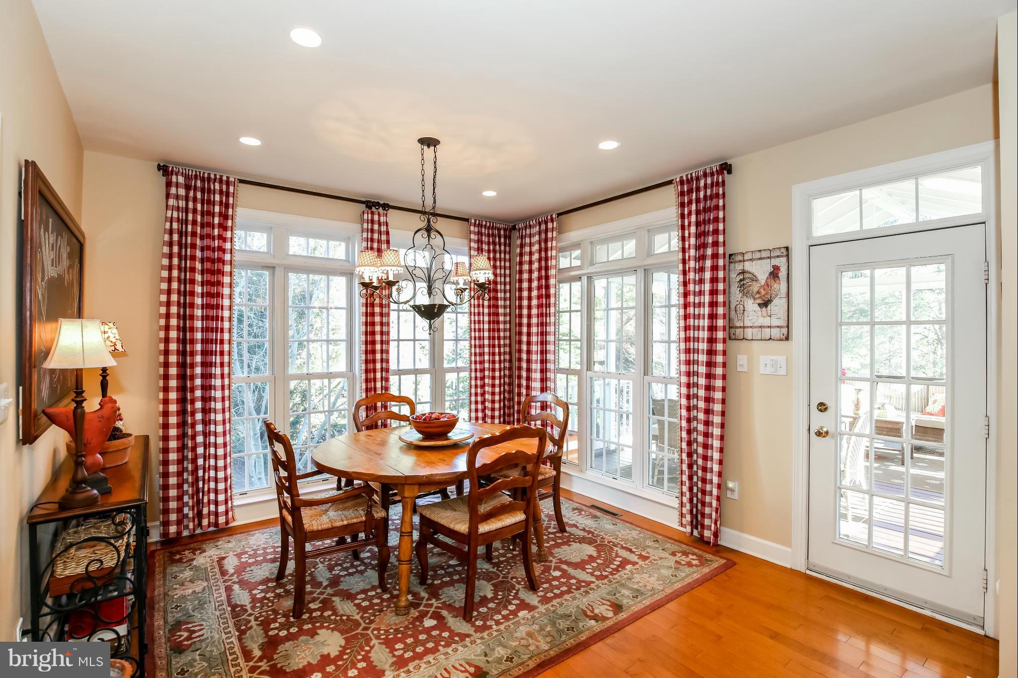 10403 Grey Fox Road Potomac, MD 20854 - Photo 8 of 23 a view of a dining room with furniture window and outside view