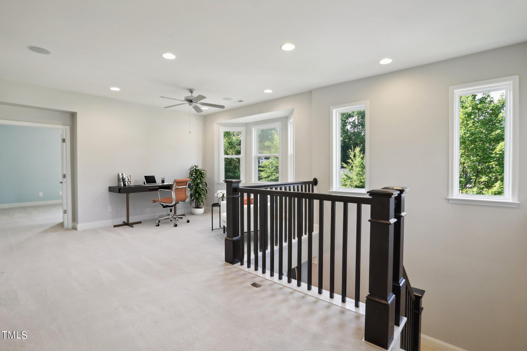 517 Plainview Avenue Raleigh, NC 27604 - Photo 25 of 58 a view of a room with gym equipment and a window
