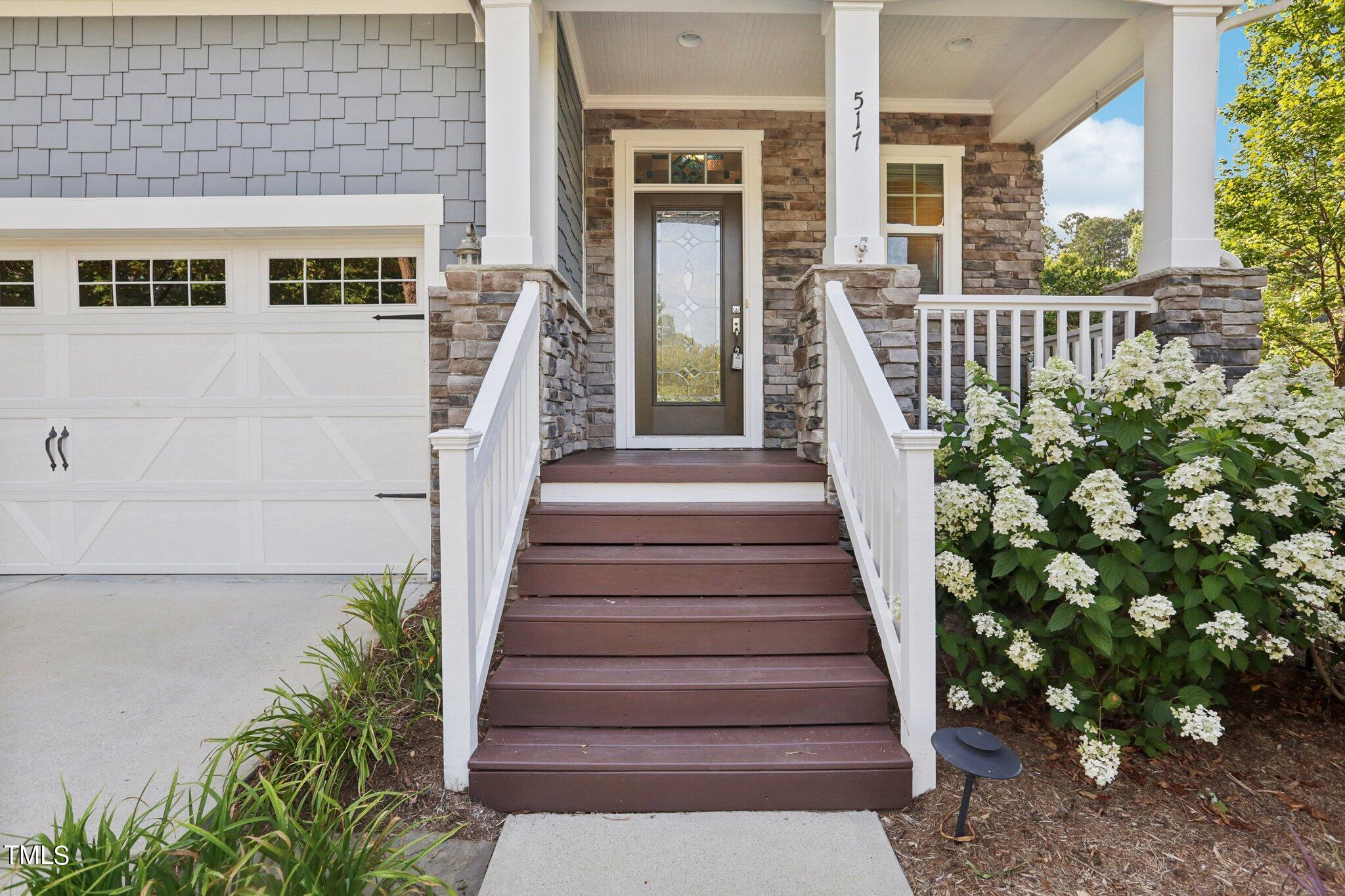 517 Plainview Avenue Raleigh, NC 27604 - Photo 3 of 58 a view of a house with entryway and wooden floor