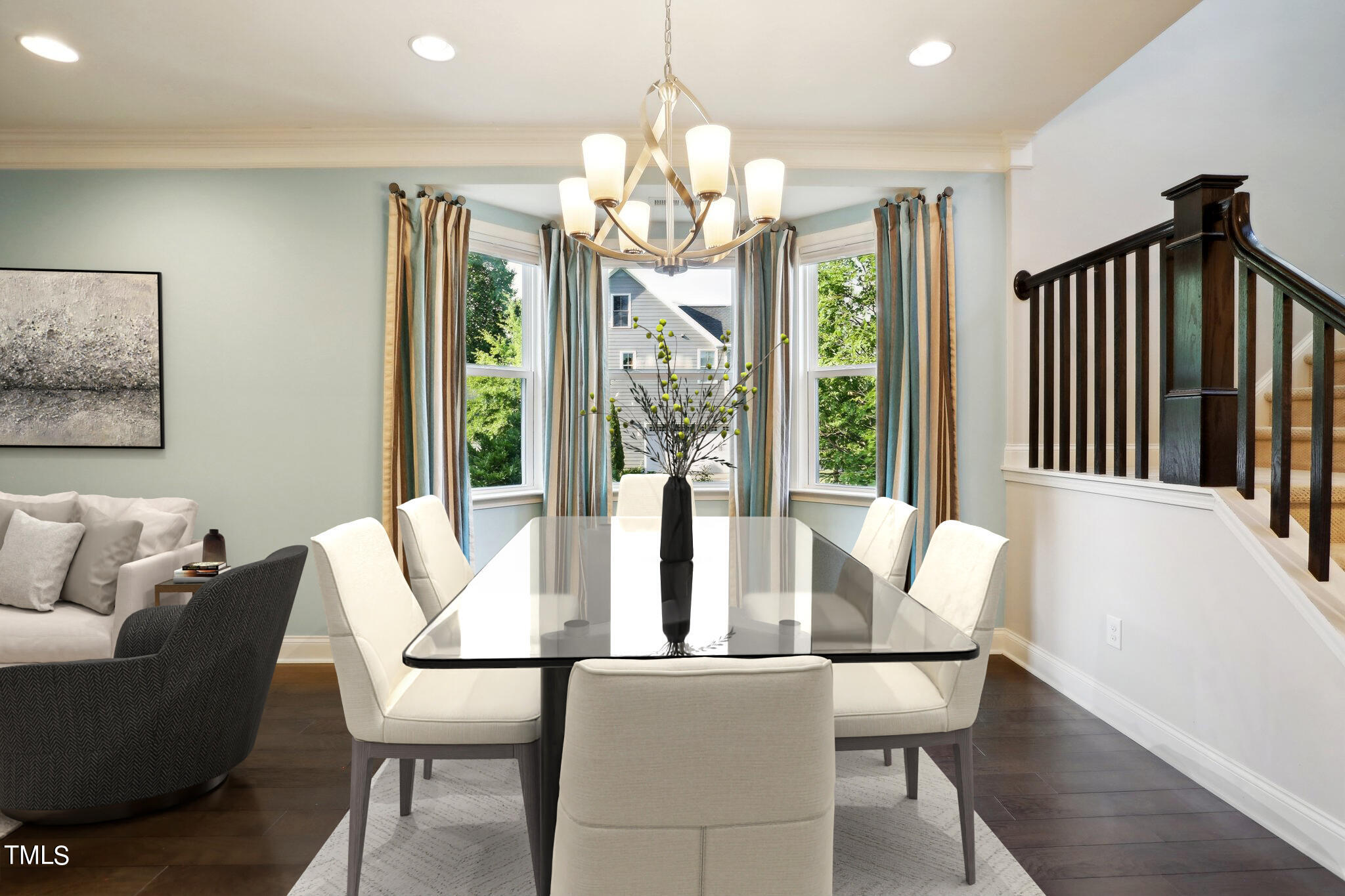 517 Plainview Avenue Raleigh, NC 27604 - Photo 10 of 58 a view of a dining room with furniture wooden floor and chandelier
