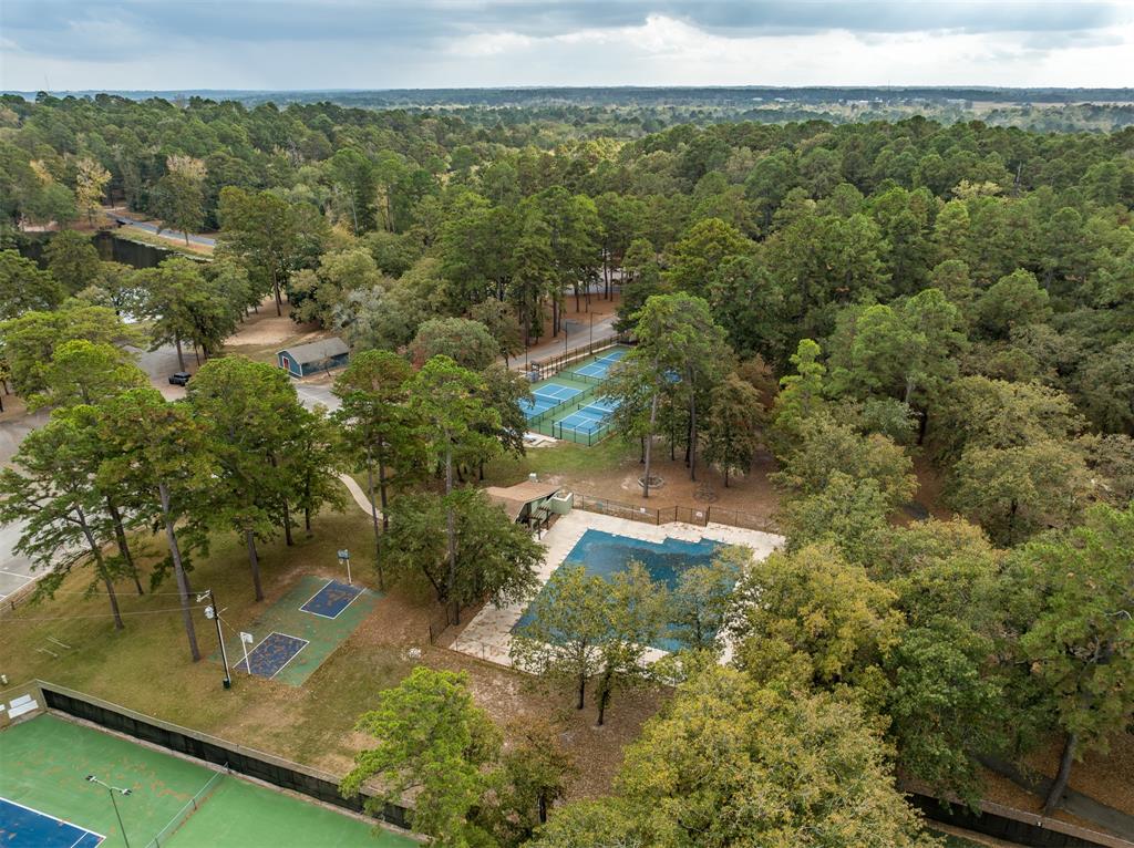 188 Candlelight Path Hawkins, TX 75765 - Photo 24 of 25 an aerial view of residential houses with outdoor space and trees