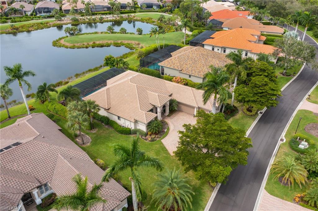 19961 Markward Crossing Estero, FL 33928 - Photo 4 of 5 an aerial view of a house with yard swimming pool and outdoor seating