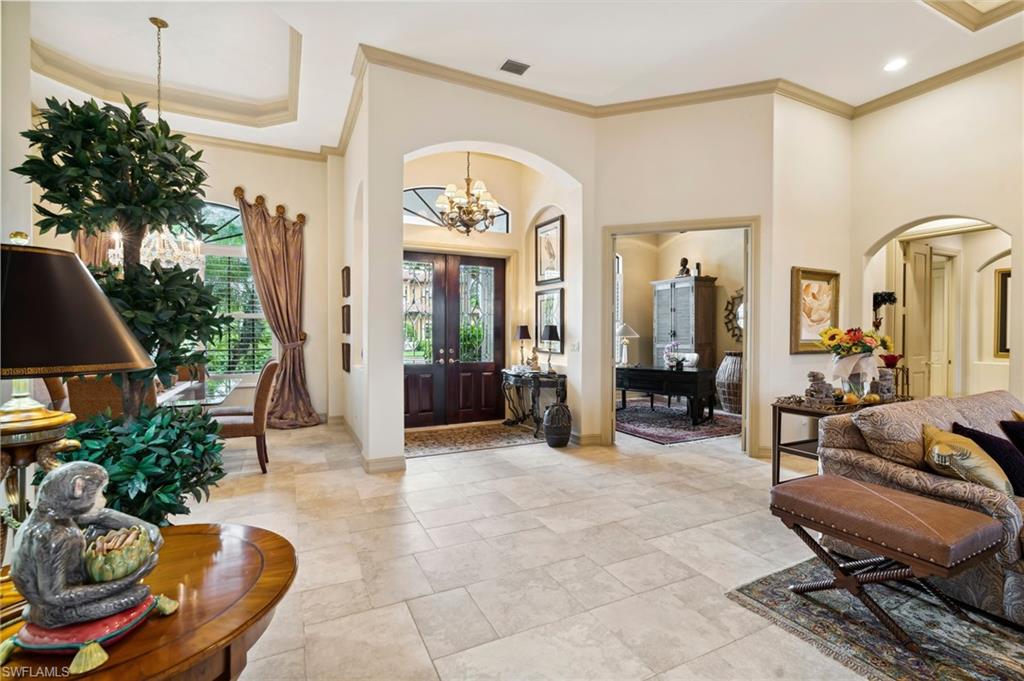 19961 Markward Crossing Estero, FL 33928 - Photo 5 of 5 a lobby with furniture and floor to ceiling window