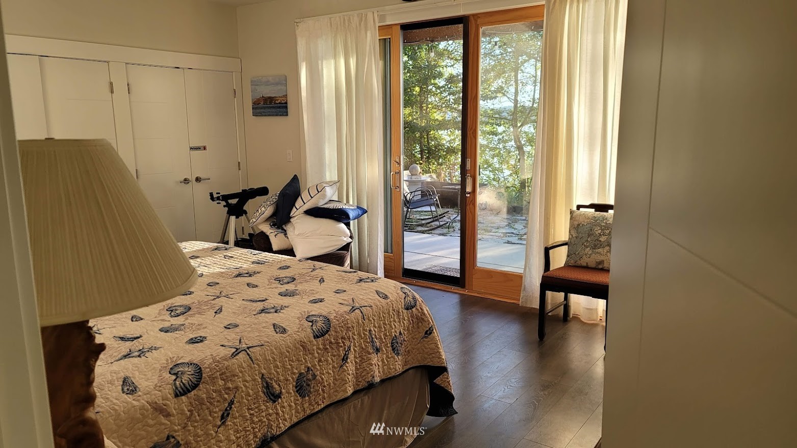 920 Ruby Street Blaine, WA 98230 - Photo 12 of 40 a bedroom with a bed and a large window