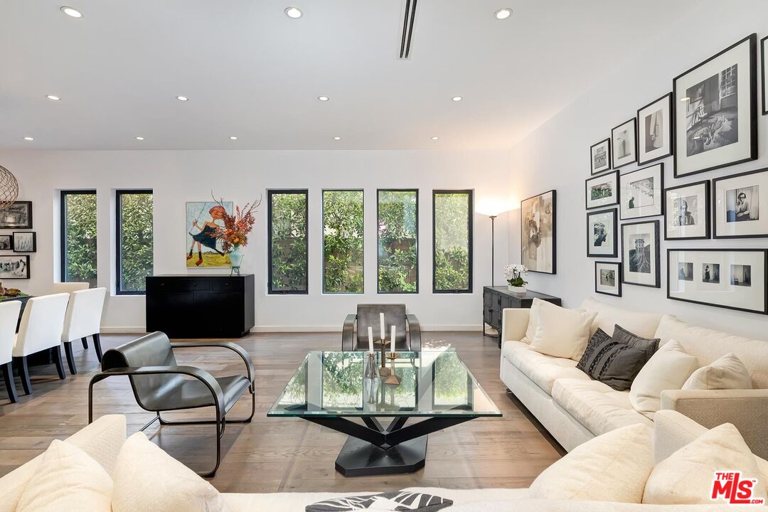 10521 Northvale Road Los Angeles, CA 90064 - Photo 11 of 52 a living room with furniture and large windows