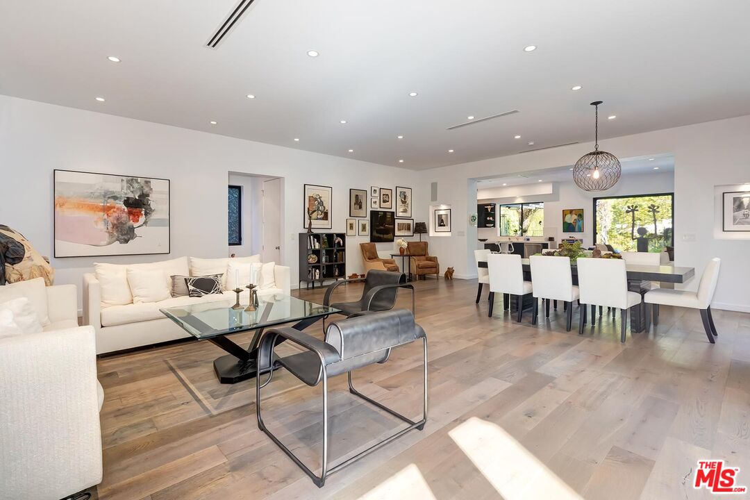 10521 Northvale Road Los Angeles, CA 90064 - Photo 15 of 52 a living room with lots of furniture and a large window