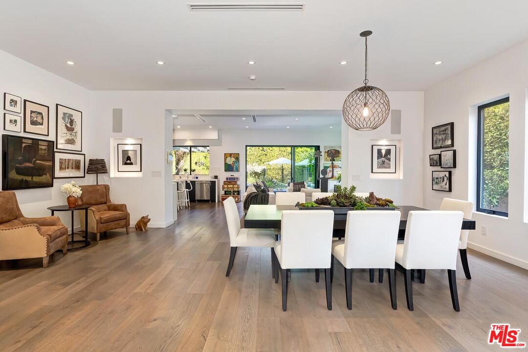 10521 Northvale Road Los Angeles, CA 90064 - Photo 18 of 52 a view of a dining room with furniture window and wooden floor