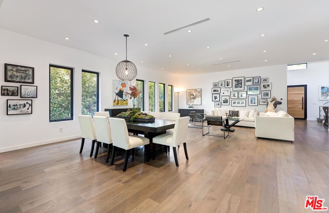 10521 Northvale Road Los Angeles, CA 90064 - Photo 2 of 52 a view of a dining room with furniture window and wooden floor