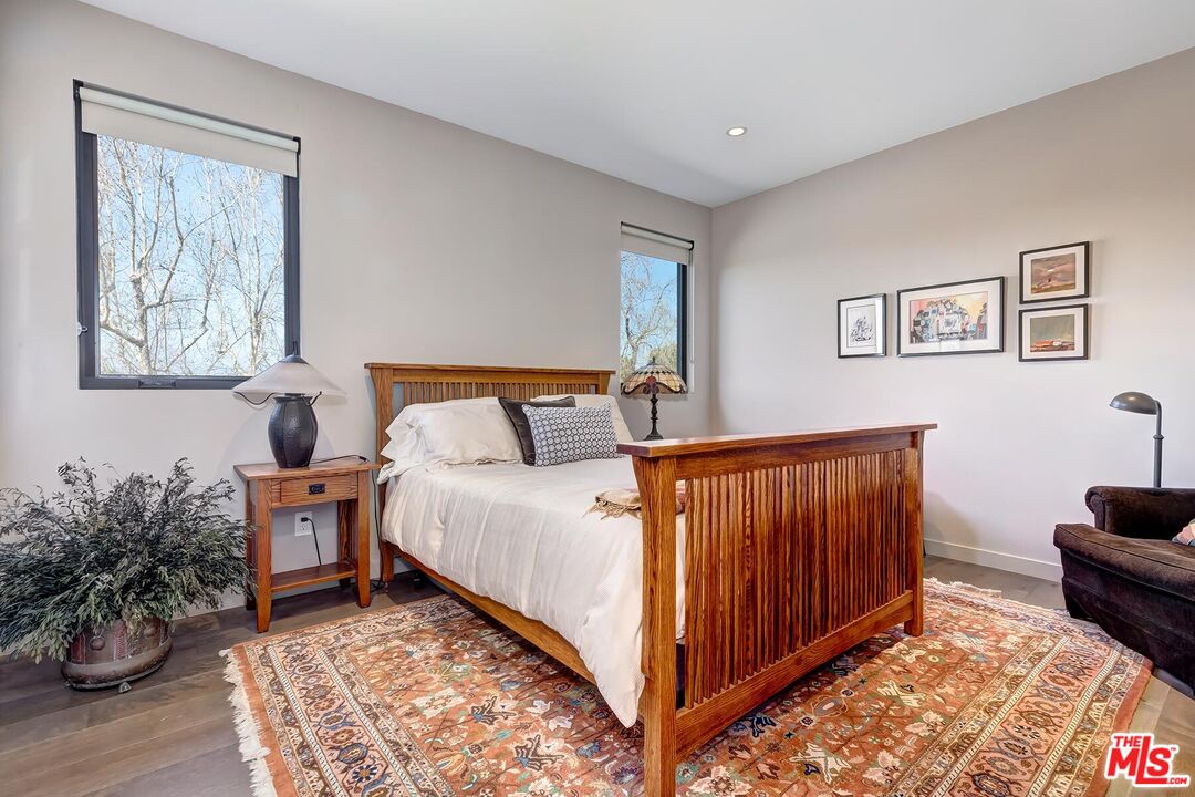 10521 Northvale Road Los Angeles, CA 90064 - Photo 35 of 52 a bedroom with furniture and a rug