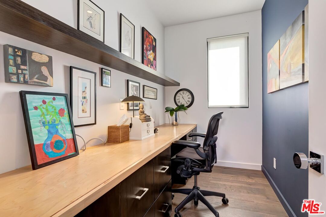 10521 Northvale Road Los Angeles, CA 90064 - Photo 43 of 52 a view of a workspace with furniture and a window