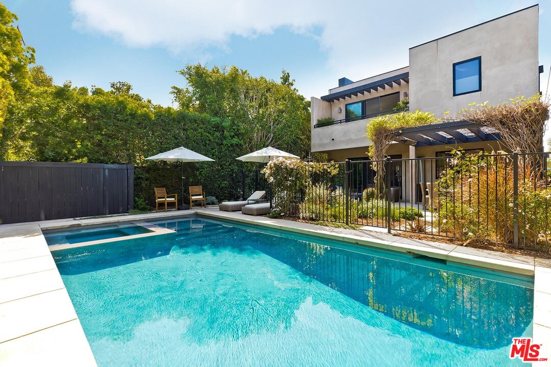 10521 Northvale Road Los Angeles, CA 90064 - Photo 49 of 52 a house view with swimming pool in front of it