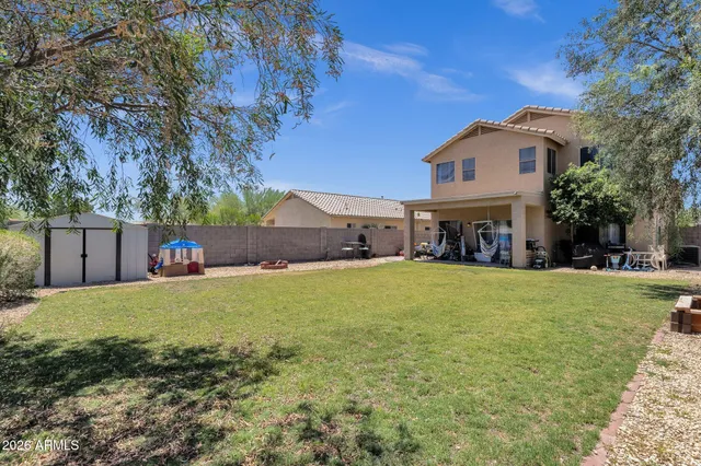 a house with trees in front of it