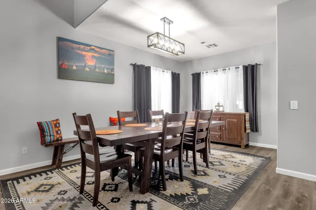 a view of a dining room with furniture