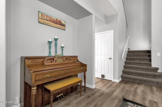 a view of entryway with wooden floor