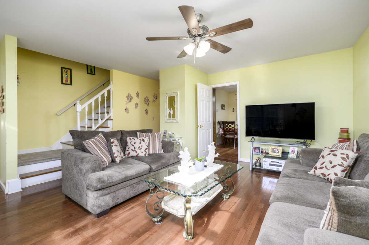 209 Seaside Avenue, Unit 2 Stamford, CT 06902 - Photo 4 of 19 a living room with furniture and a flat screen tv