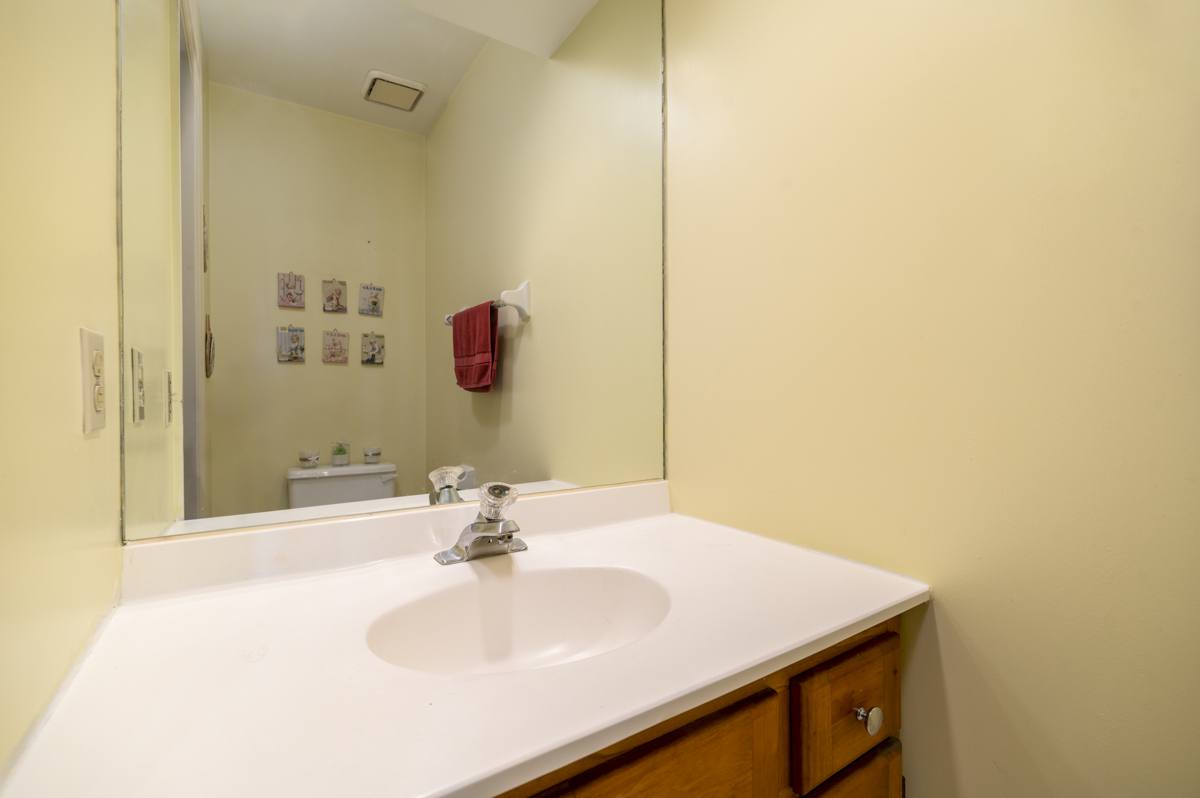 209 Seaside Avenue, Unit 2 Stamford, CT 06902 - Photo 9 of 19 a bathroom with a sink and a mirror