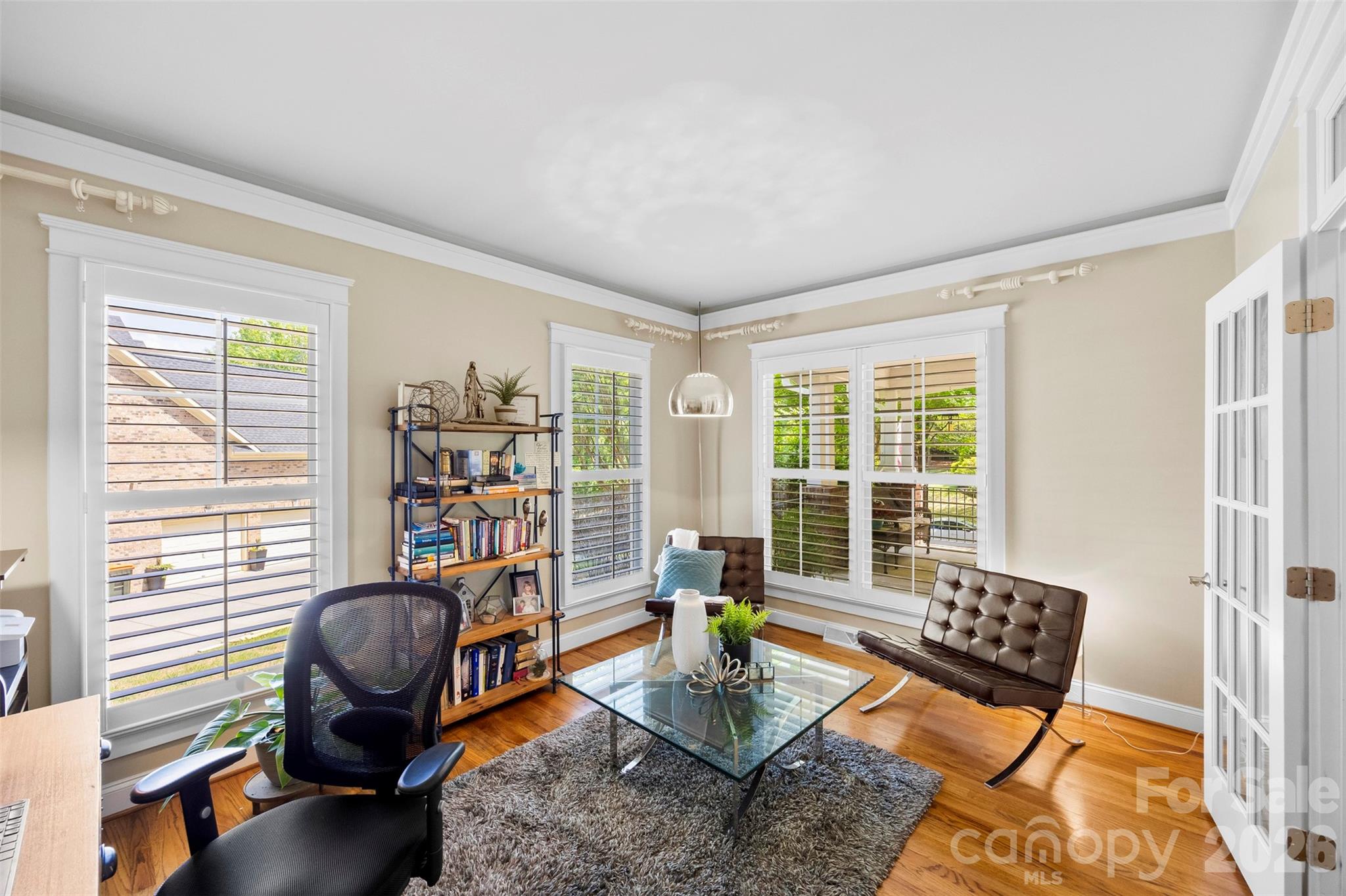 606 Andover Lane Tega Cay, SC 29708 - Photo 6 of 48 a view of a livingroom with workspace and a window