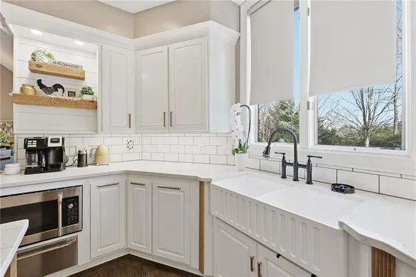 a view of entryway livingroom and hall with wooden floor