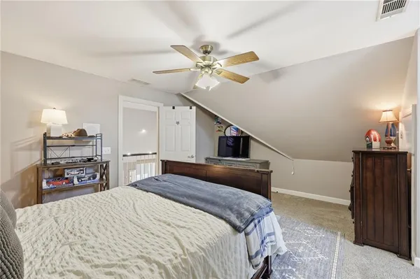 a room with furniture and gym equipment