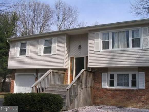 a front view of a house with yard