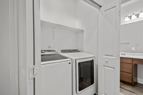 a utility room with dryer and washer