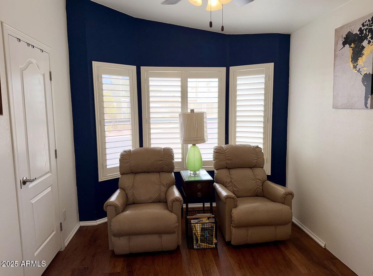 2929 East Main Street, Unit 219 Mesa, AZ 85213 - Photo 17 of 56 a living room with furniture and a window