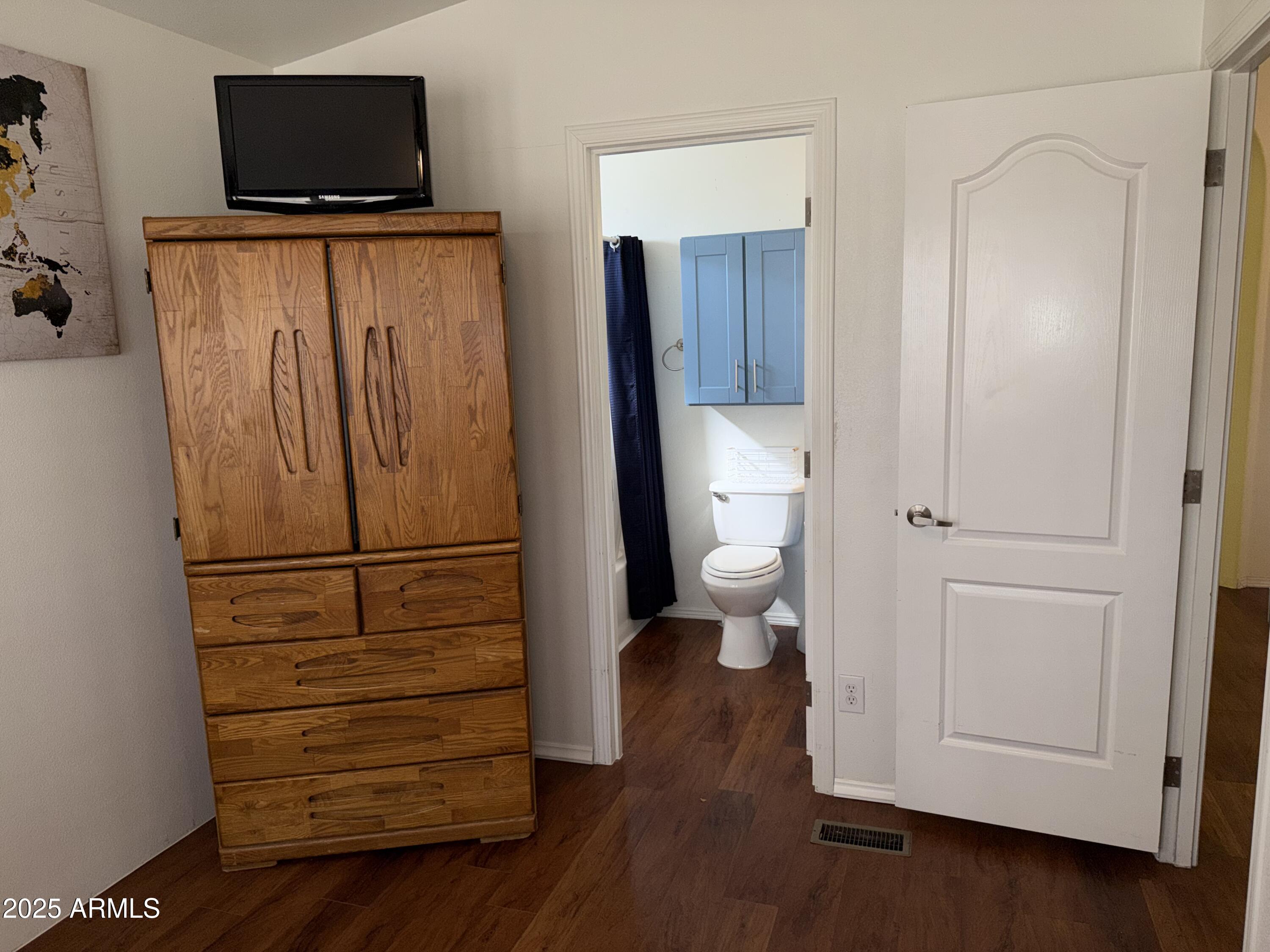2929 East Main Street, Unit 219 Mesa, AZ 85213 - Photo 18 of 56 a view of a room with wooden floor and bathroom
