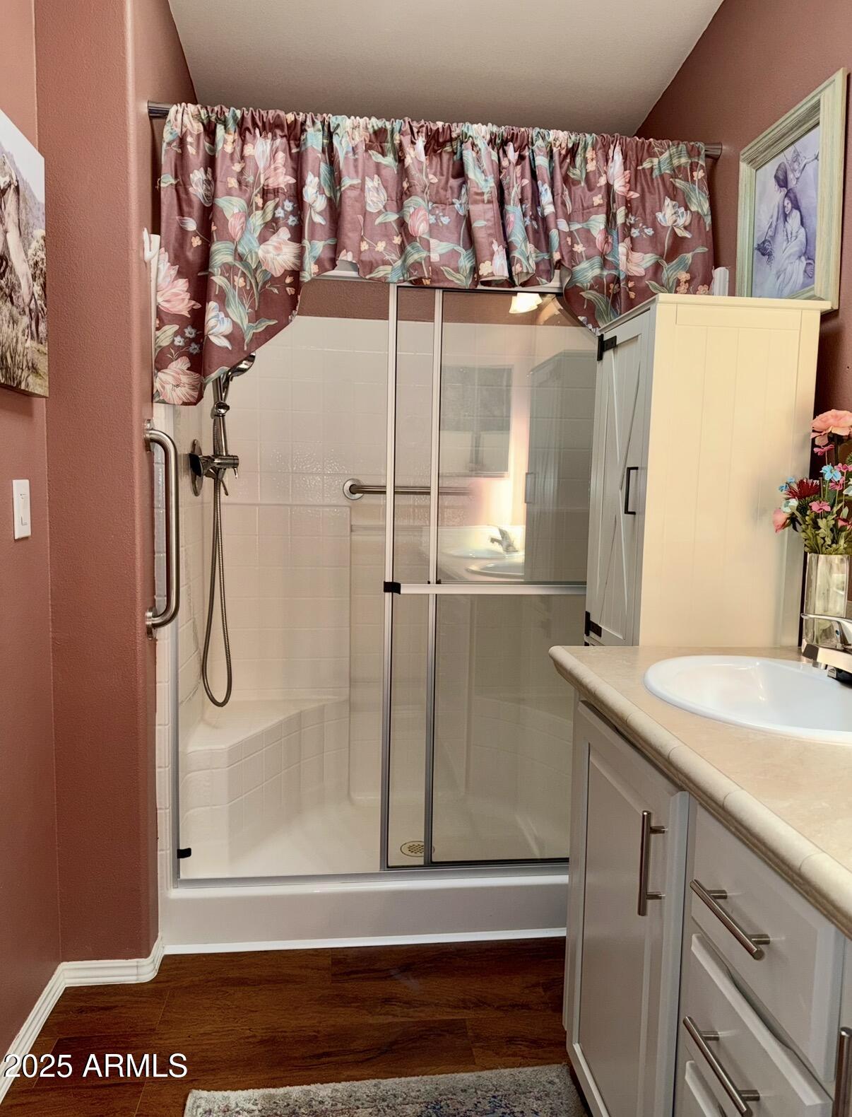 2929 East Main Street, Unit 219 Mesa, AZ 85213 - Photo 22 of 56 a bathroom with a shower and a sink