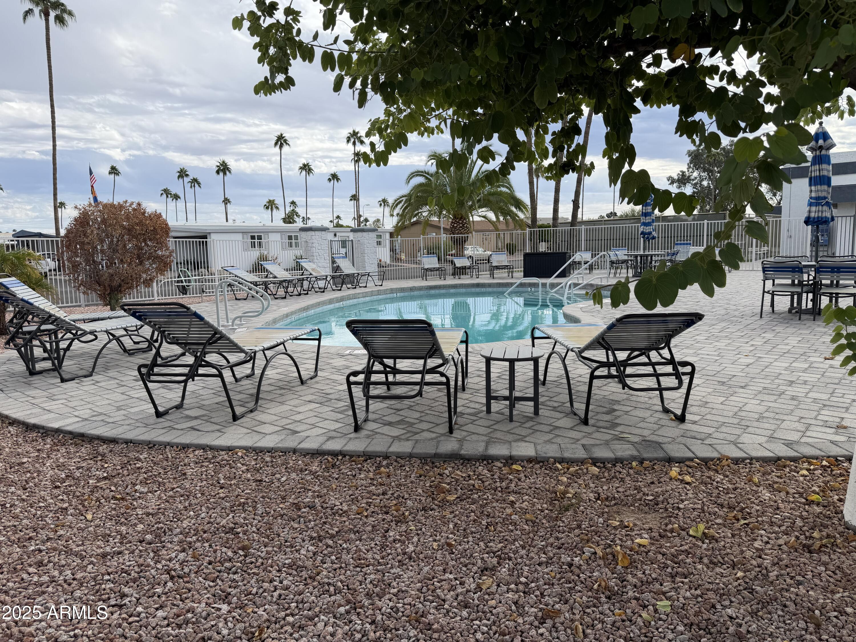 2929 East Main Street, Unit 219 Mesa, AZ 85213 - Photo 37 of 56 a view of an outdoor space with seating