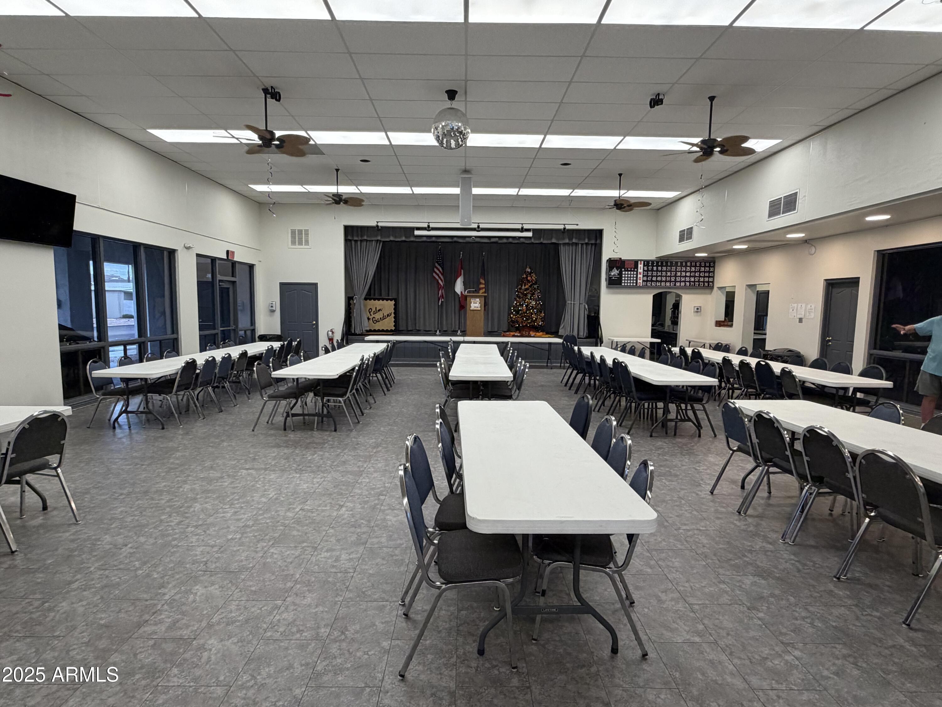 2929 East Main Street, Unit 219 Mesa, AZ 85213 - Photo 47 of 56 a large kitchen with a table and chairs