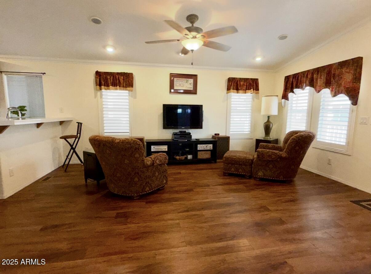 2929 East Main Street, Unit 219 Mesa, AZ 85213 - Photo 7 of 56 a living room with furniture window and wooden floor