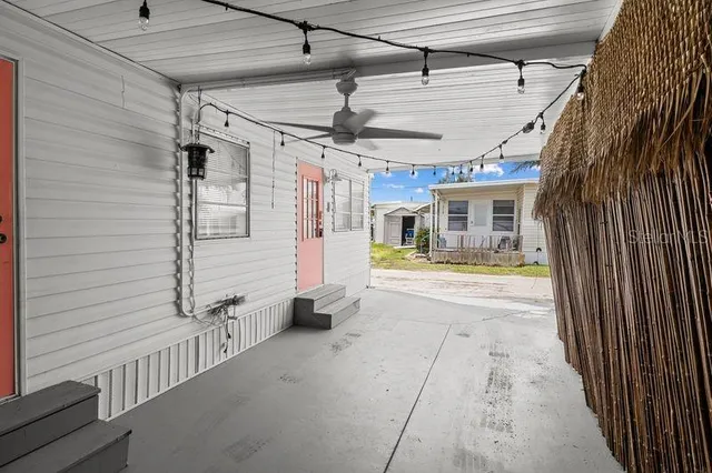 a view of water heater room with a garage