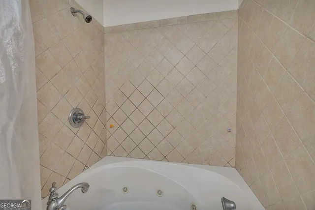 a bathroom with a bathtub