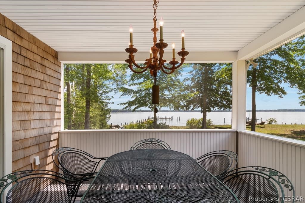 90 Bar Point Road Lancaster, VA 22503 - Photo 25 of 33 a picture of a table and chairs in patio