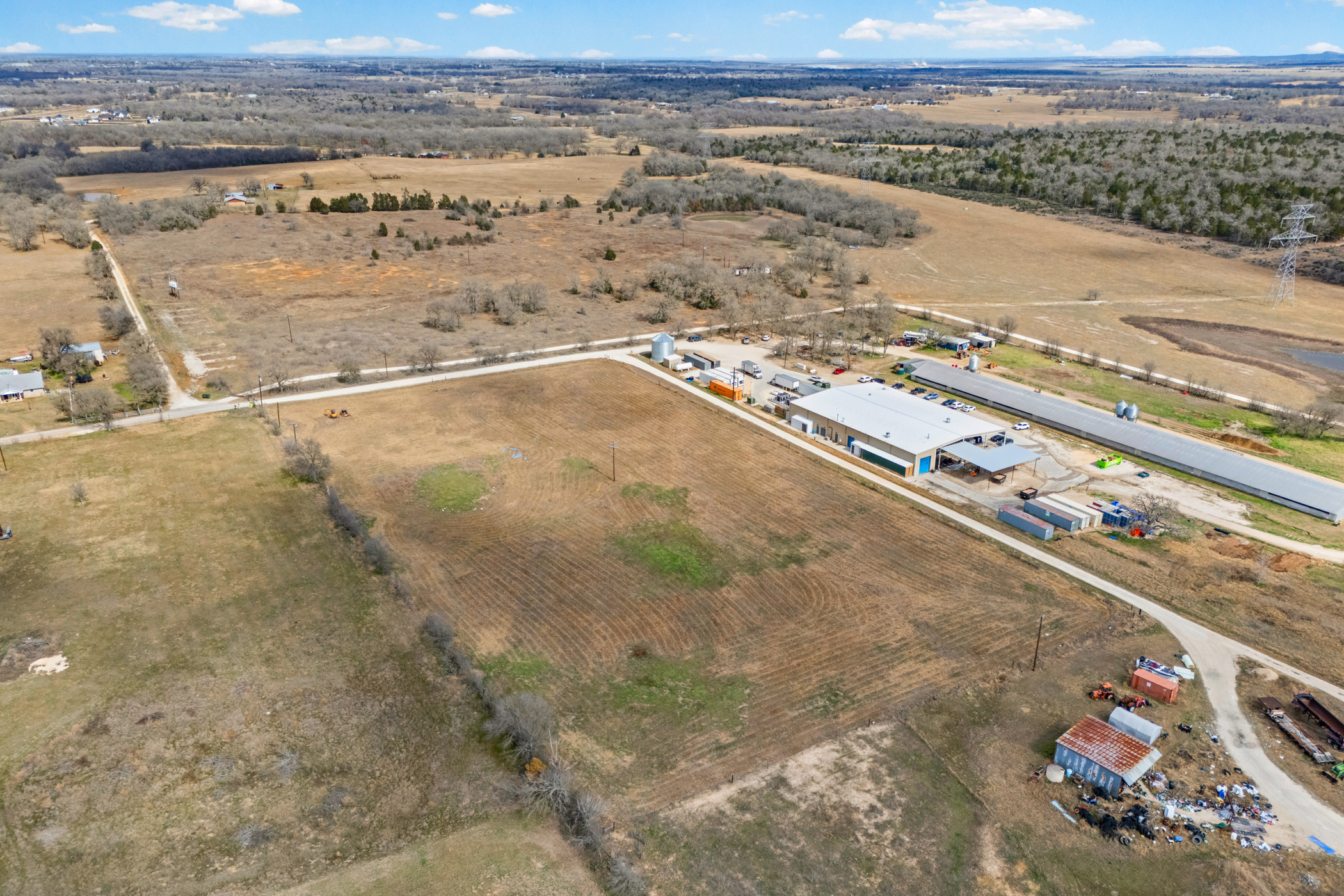 296 Blisard Road, Unit C Elgin, TX 78621 - Photo 6 of 12 Aerial overview of property's location featuring rural landscape