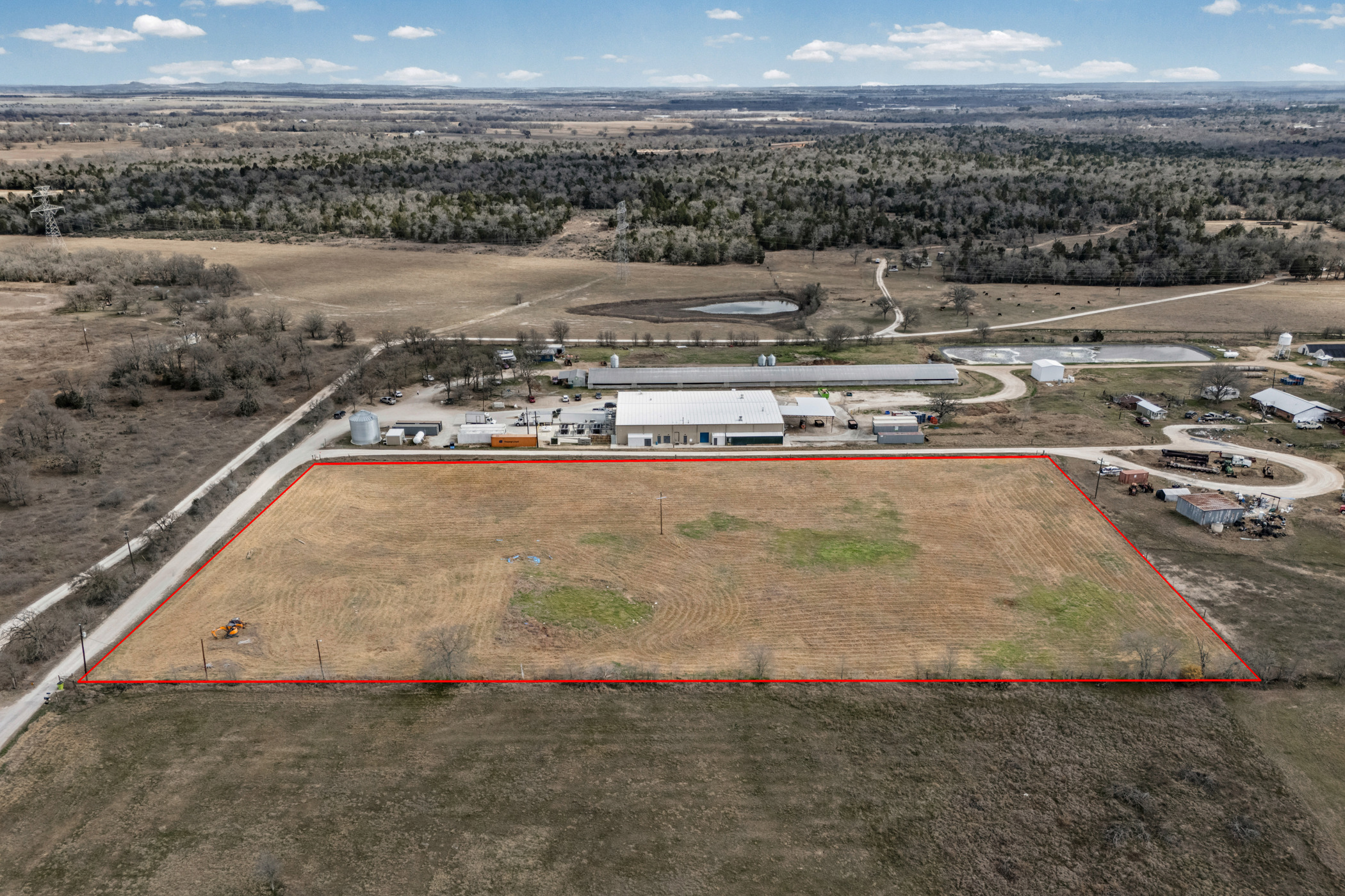 296 Blisard Road, Unit C Elgin, TX 78621 - Photo 7 of 12 Aerial view of sparsely populated area with property parcel outlined