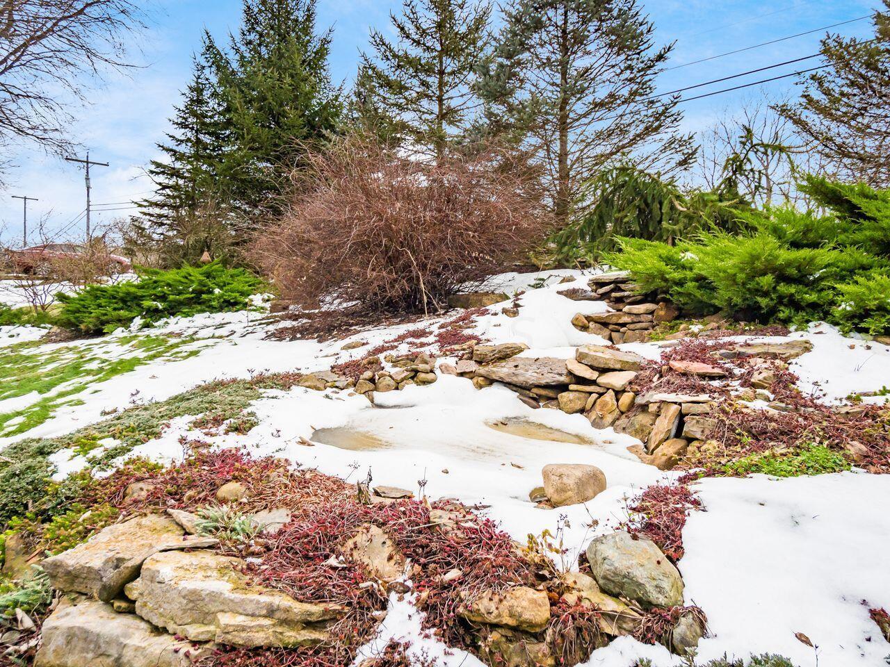 3737 Olentangy River Road Delaware, OH 43015 - Photo 49 of 70 Under the snow is a one of 4 fountains outside the house.