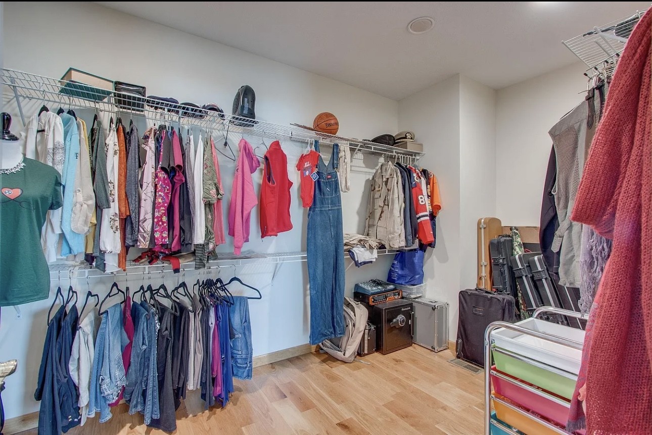 879 Tidwell Road Burns, TN 37029 - Photo 6 of 20 a view of walk in closet with clothes