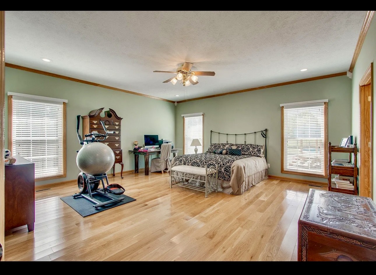 879 Tidwell Road Burns, TN 37029 - Photo 8 of 20 a living room with furniture hard wood floor and a chandelier