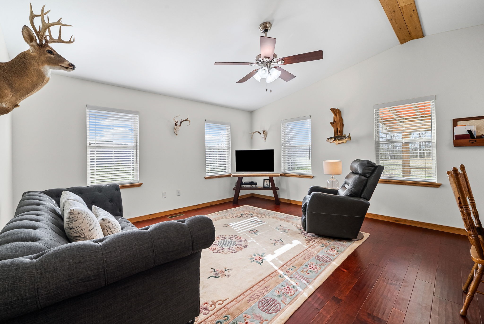 959 Herman Adams Road Cumberland City, TN 37050 - Photo 18 of 62 a living room with furniture and a flat screen tv
