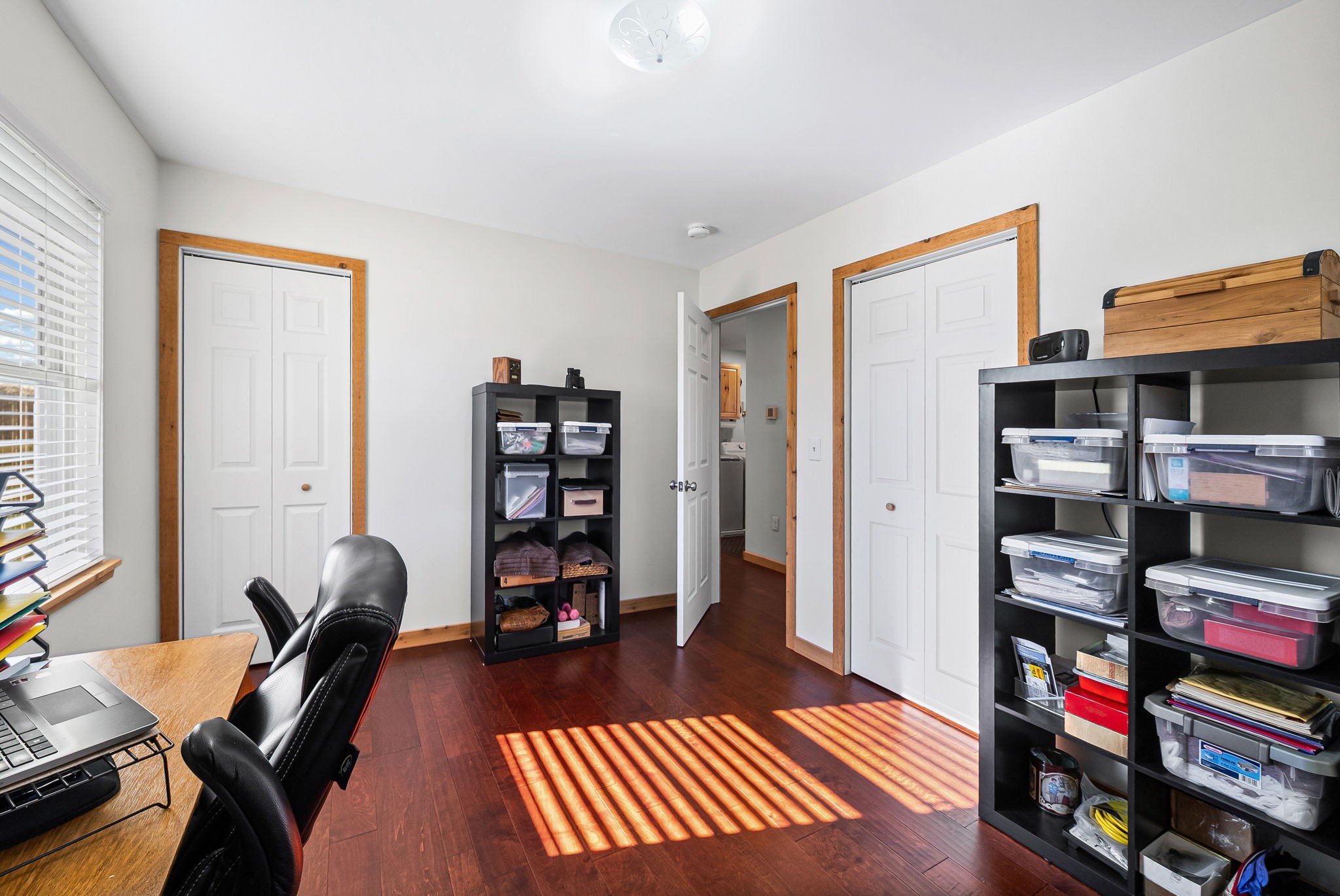 959 Herman Adams Road Cumberland City, TN 37050 - Photo 20 of 62 a bedroom with furniture and a book shelf